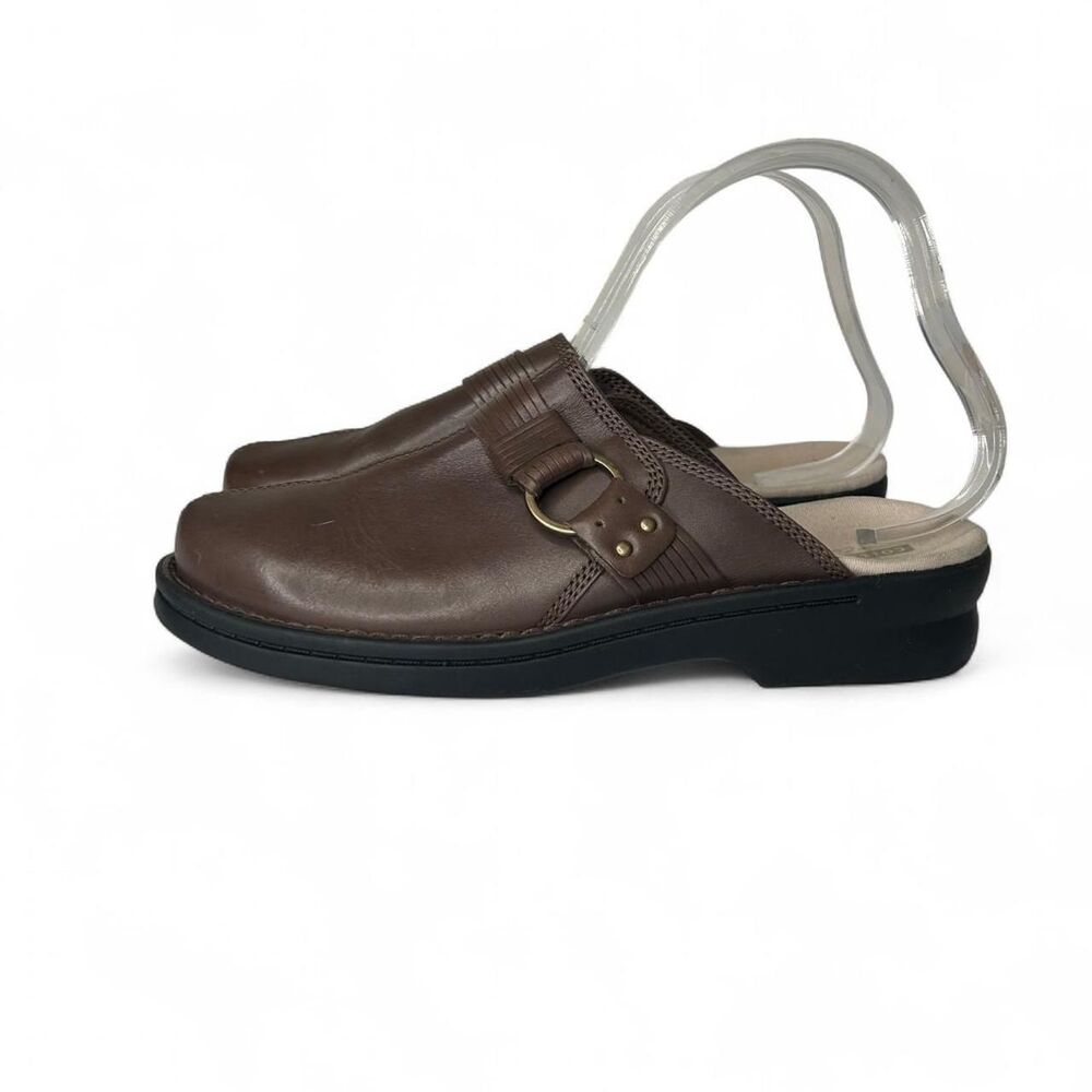 Clark’s Faux Brown leather clogs with buckle detail. Size: US 8